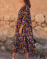 Nathalie | Abito con scollo a V e stampa retrò