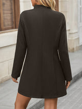 Cappotto elegante con colletto dritto e bottoni classici